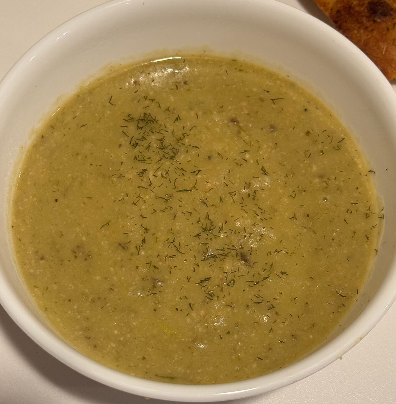 Creamy vegan potato and leek soup made with leeks, russet potatoes, cashews, and vegetable broth. Perfect for a cozy, chilly day.