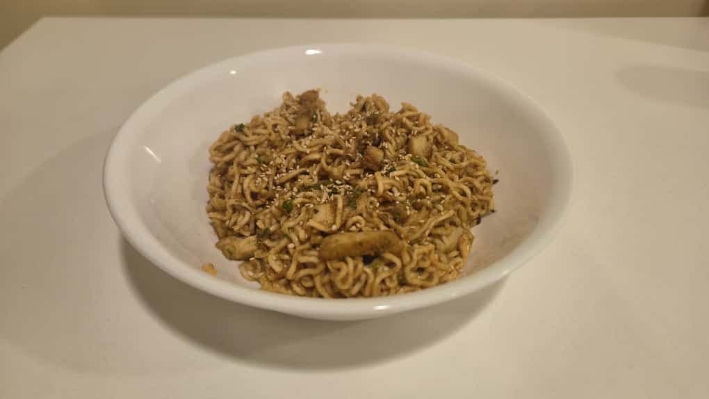 Vegan peanut butter ramen with creamy sauce, sesame oil, and scallions. A quick and comforting meal.