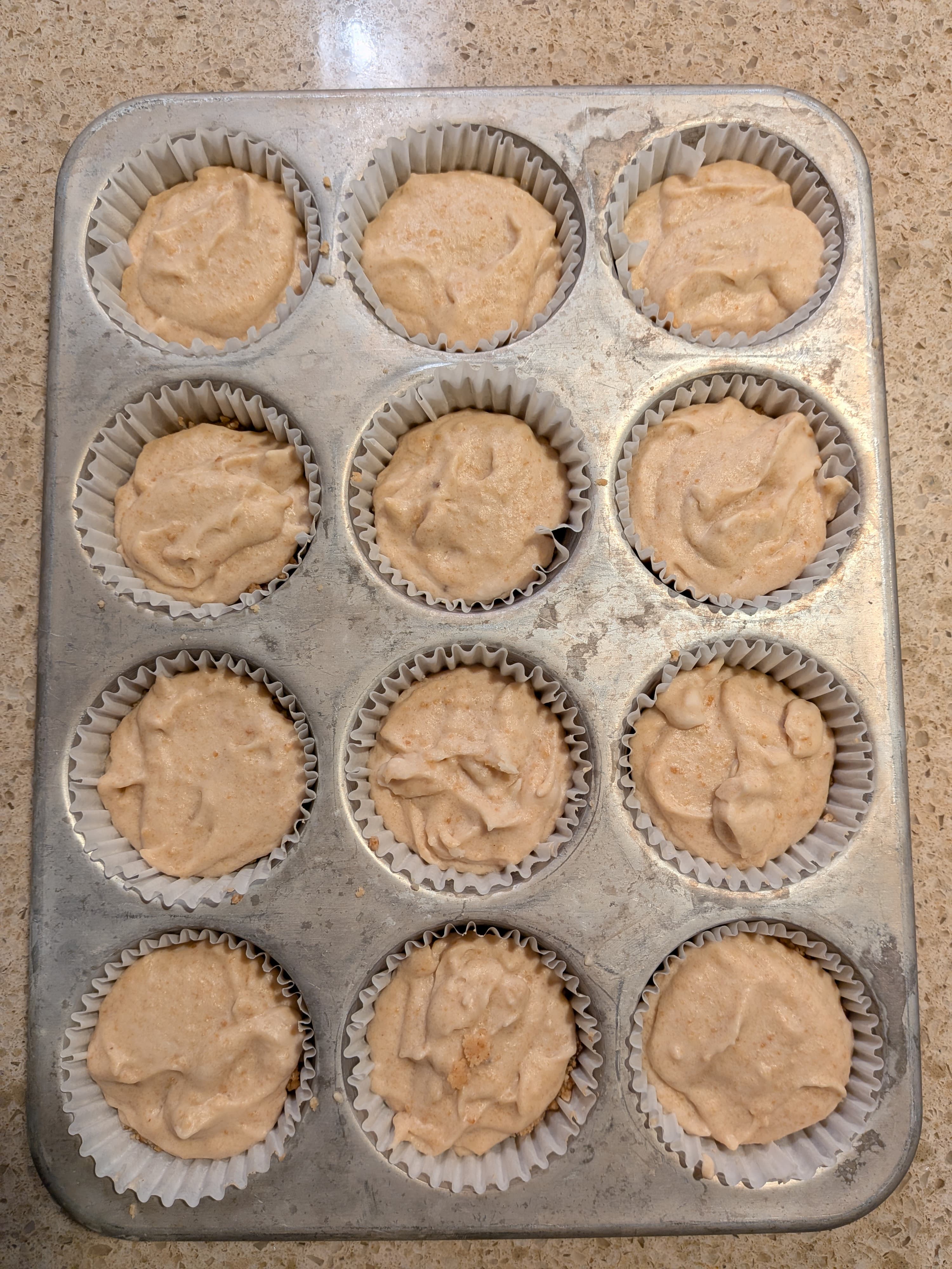 Fill vegan cheesecake cups with cream filling